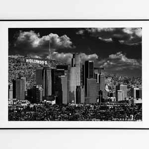 Downtown Los Angeles skyline with the Hollywood sign in the background in black and white wall art print poster image 1