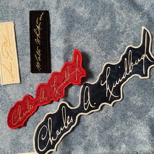 Broderade strykmärken för handstil och kalligrafi