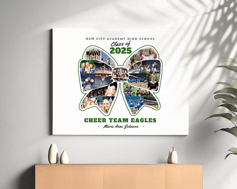 May include: A white canvas print with a green bow made of photos of a cheerleading squad. The text "New City Academy High School" is at the top, followed by "Class of 2025". Below the bow is the text "Cheer Team Eagles - Marie Anne Johnson - "