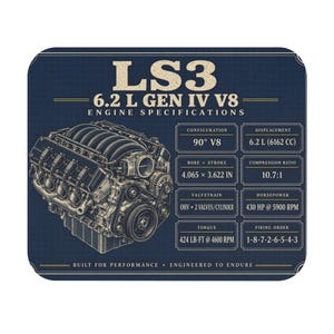 May include: A rectangular navy blue mousepad featuring a detailed technical illustration of an LS3 6.2 L Gen IV V8 engine. The design includes engine specifications such as 90 degree V8 configuration, 4.065 x 3.622 inch bore and stroke, and 430 HP at 5900 RPM.
