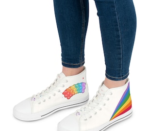 May include: White high-top canvas sneakers with a rainbow gummy bear design on one shoe and a rainbow stripe on the other.