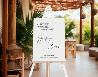 May include: White sign with black text announcing a wedding for Jason and Erin. The text reads "All because two people swiped right." The date and location are also included: "August 18, 2023, Hamptons, NY | Perona Farms."