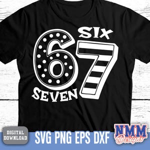 May include: Black t-shirt with a white graphic featuring the numbers "6" and "7" and the word "SEVEN". The number "6" is dotted, and the number "7" has horizontal stripes. The word "SIX" is above the number "7".
