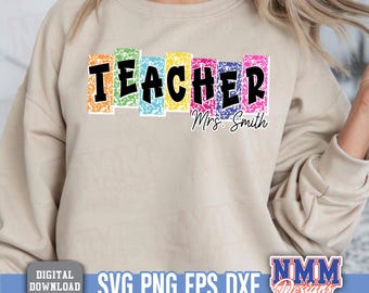 May include: Beige sweatshirt with the word "TEACHER" in colorful, block letters. The name "Mrs. Smith" is written below the word "TEACHER". The sweatshirt has a digital download graphic.
