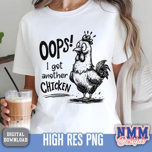 May include: White t-shirt with a black and white cartoon chicken graphic. The text on the shirt reads "OOPS! I got another CHICKEN". The design includes the words "DIGITAL DOWNLOAD" and "HIGH RES PNG".