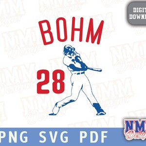 May include: A blue silhouette of a baseball player with a bat, wearing a baseball uniform with the number 28 on the front. The text "BOHM" is above the player in red letters.