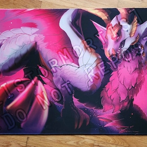 May include: A pink and white dragon with gold accents is flying through a purple and pink sky. The dragon has large, feathery wings and a long, pointed tail. The dragon's eyes are glowing red.