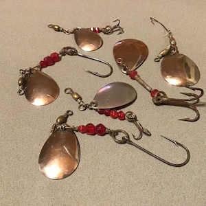 Rare old fishing lure spinners. Vintage tackle with silver/copper colored blades and red beads. Great for collectors or display gift. Nice