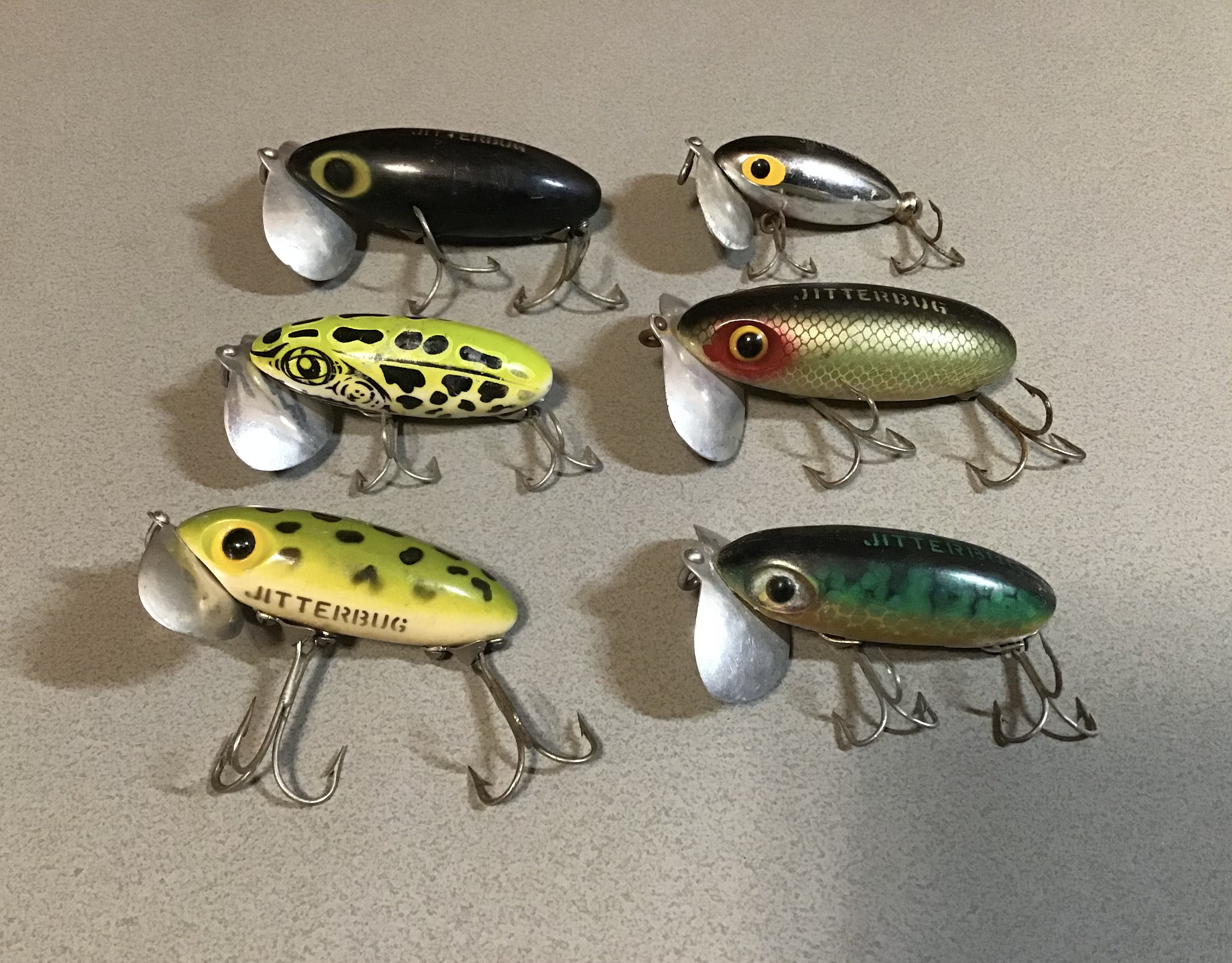 Vintage Fred Arbogast jitterbug fishing lures. Old bass tackle baits with  rare color patterns. Great display or for any avid collector