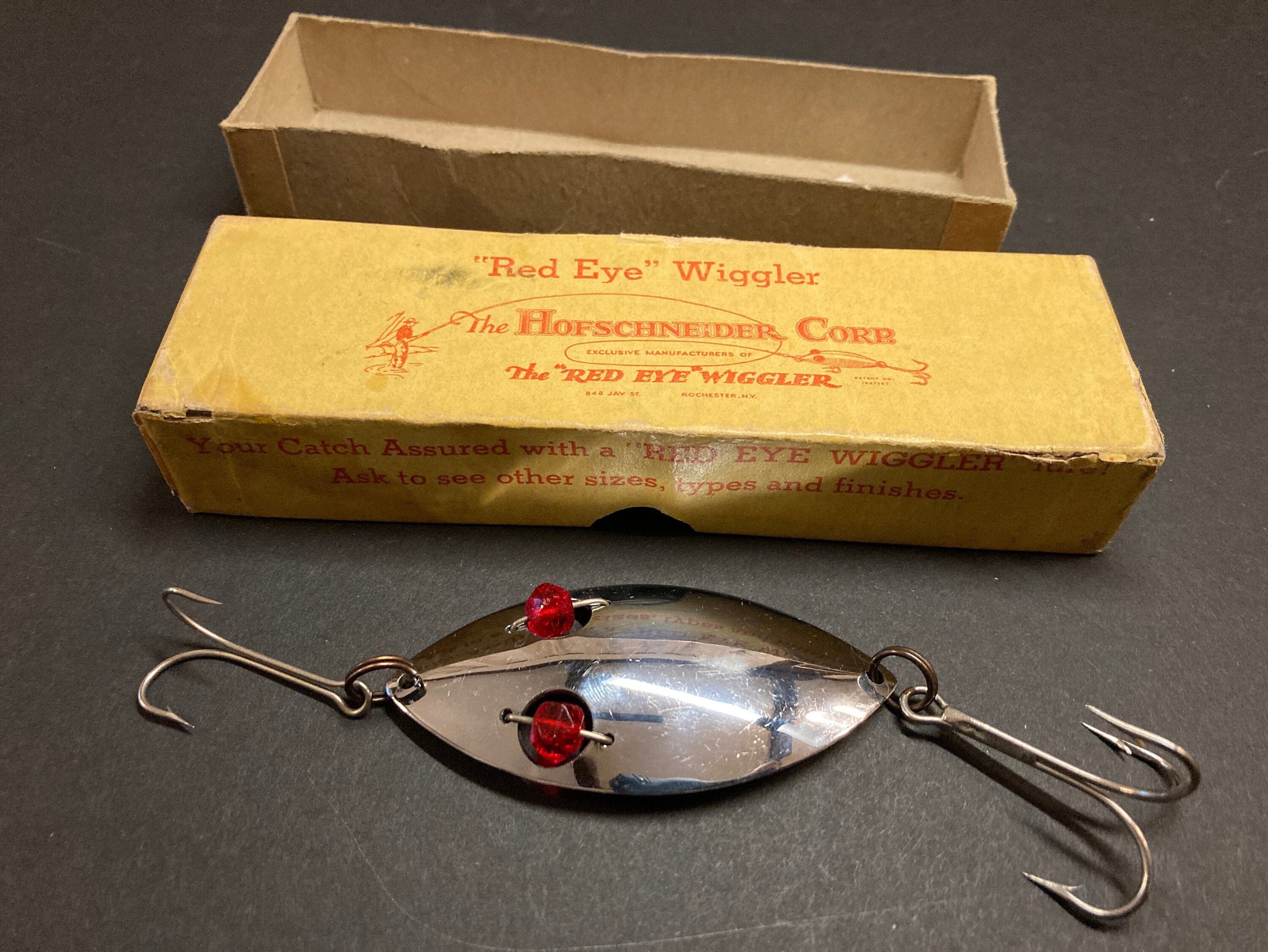 Rare vintage fishing lure original boxed Hofschneider red eye wiggler. Old  collectable tackle spoon bait