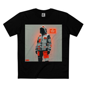 May include: Black t-shirt with a digital art print. The image shows a figure in a futuristic jacket with orange details and text labels. The text "NO IDENTITY FOUND" is displayed. The t-shirt has a crew neck and short sleeves.