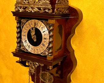 Vintage Dutch Zaanse Wall Clock with Atlas Crest 8 Day Weight Driven Bell Strike Mechanical Clock