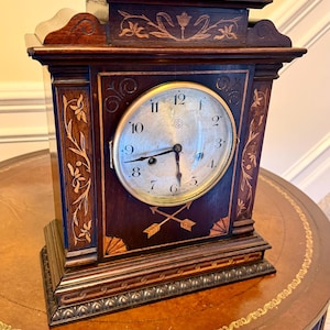 Antique Hamburg-Amerikanische Uhrenfabrik (HAC)  8-Day Wood Inlaid Mantel Clock with Strike – Floral Marquetry & Arrows Design