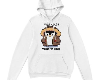 Può includere: Felpa con cappuccio bianca con un pinguino dei cartoni animati che indossa un cappotto marrone e un cappuccio di pelliccia bianca. Il testo sulla felpa recita "Y'all cold? 'Cause I'm cold."