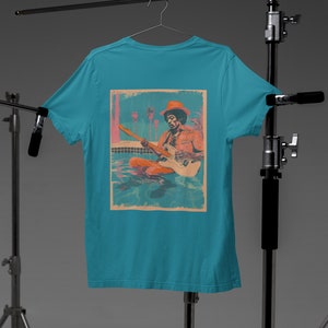 Jimi Hendrix T-shirt | Jimi Hendrix playing guitar in a pool | Vintage art of legendary Jimi Hendrix | Jimi Hendrix alive | Jimi in a pool