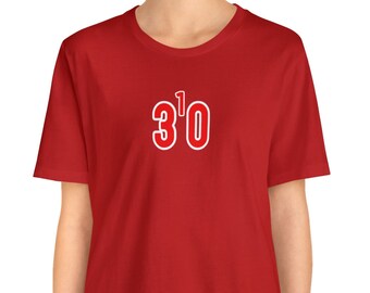 May include: Red t-shirt with a white outline of the number "3'0" printed on the front.
