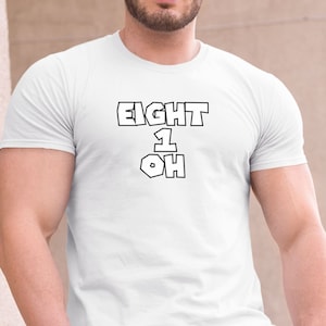 May include: White t-shirt with black text that reads "EIGHT 1 OH"