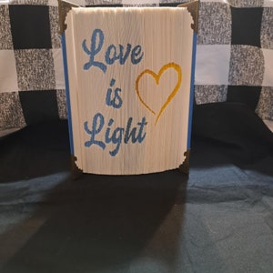 bookfolding pattern love is light cut and fold