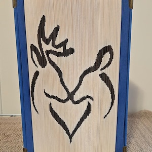 bookfolding pattern cut and fold two deer shape of heart