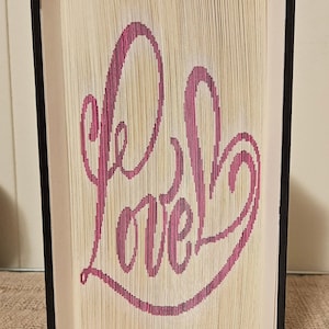bookfolding pattern word love cut and fold