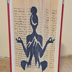 bookfolding pattern cut and fold meditation lady