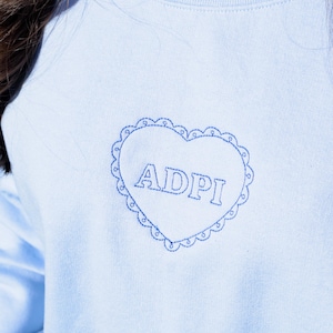 Alpha Delta Pi Embroidered Coquette Heart Crewneck Sweatshirt