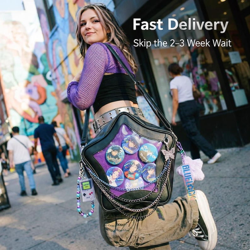 May include: Black star-shaped shoulder bag with a clear purple window displaying anime character buttons. The bag has silver chain accents, a butterfly charm, and a beaded game console keychain. The text "Fast Delivery" is visible.