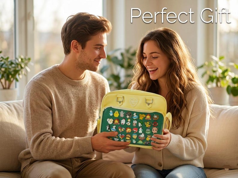 May include: A yellow satchel with a green panel featuring various cartoon characters is held by a person. The satchel has a handle and two small buckles. The text "Perfect Gift" is displayed above the satchel.