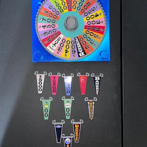 Early 2000s Era Wheel of Fortune Board Game Wheel - 6.73 inches across -   www.makngames.com
