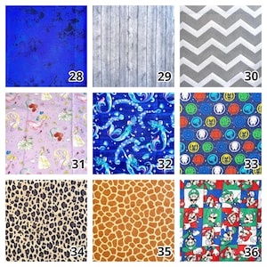 May include: A grid of nine fabric swatches labeled 28 through 36. Patterns include blue mottled texture, gray wood grain, gray chevron, Disney princesses, mermaids, Marvel superhero icons, leopard print, giraffe spots, and Mario and Luigi characters.