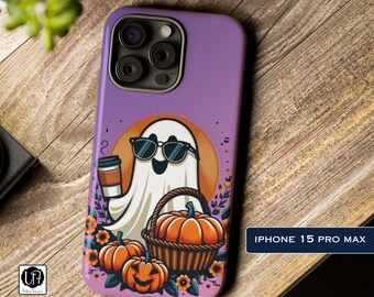 May include: A purple iPhone 15 Pro Max phone case featuring a cartoon ghost wearing sunglasses and holding a cup of coffee. The ghost is surrounded by pumpkins and flowers. The text "IPHONE 15 PRO MAX" is printed on the bottom right corner of the case.