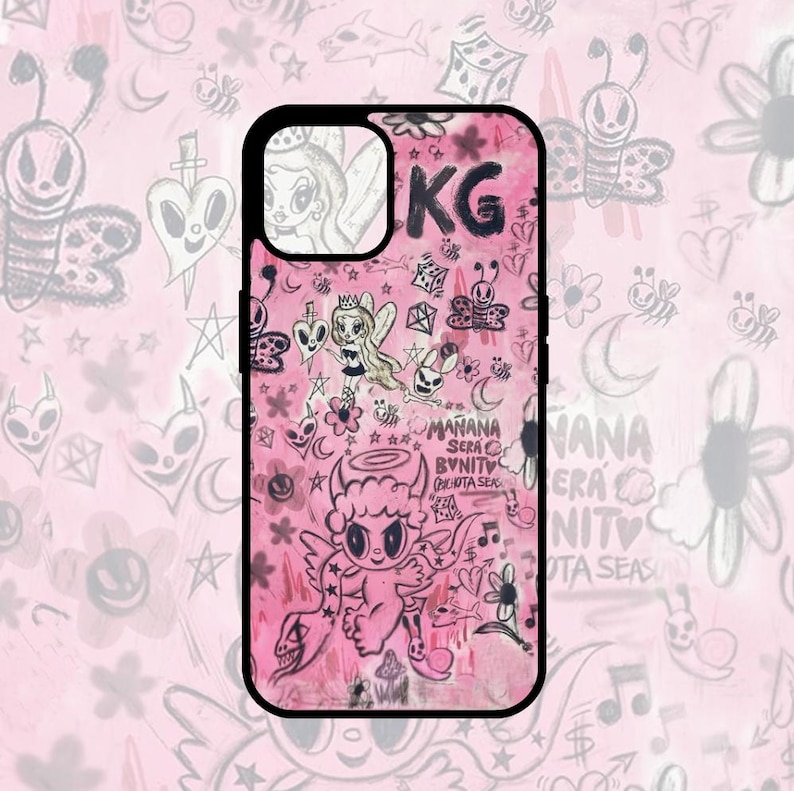 Pode incluir: Uma capa de telefone rosa com borda preta. A capa &eacute; coberta por uma variedade de ilustra&ccedil;&otilde;es desenhadas &agrave; m&atilde;o, incluindo um anjo alado, um diabo, um cora&ccedil;&atilde;o e estrelas. O texto "MANANA SERA BONITO" est&aacute; escrito na capa.