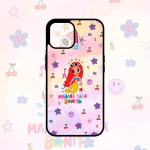 Pode incluir: Uma capa de telefone rosa e branca com uma sereia de desenho animado com cabelo vermelho e cauda amarela. A capa tem um arco-&iacute;ris, estrelas, cerejas e flores. O texto "Ma&ntilde;ana Ser&aacute; Bonito" est&aacute; na capa.