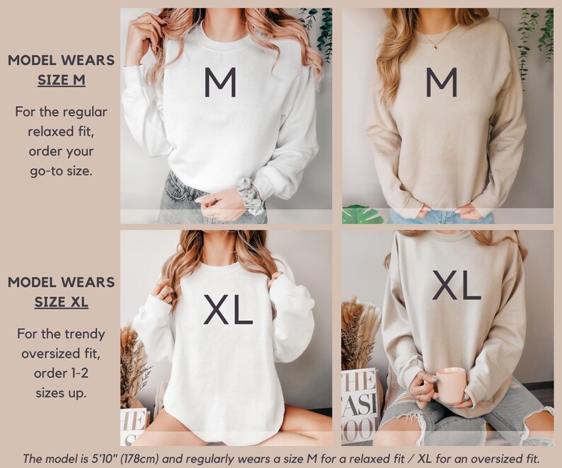 May include: Two models wearing white and beige sweatshirts with the text "M" and "XL" printed on them. The model wearing the "M" sweatshirt is wearing jeans and the model wearing the "XL" sweatshirt is wearing jeans and holding a mug. The text "MODEL WEARS SIZE M" and "MODEL WEARS SIZE XL" is displayed above each model. The text "For the regular relaxed fit, order your go-to size." is displayed below the model wearing the "M" sweatshirt. The text "For the trendy oversized fit, order 1-2 sizes up." is displayed below the model wearing the "XL" sweatshirt. The text "The model is 5'10" (178cm) and regularly wears a size M for a relaxed fit / XL for an oversized fit." is displayed at the bottom of the image.