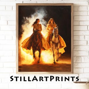 May include: A framed print featuring two women riding horses, rendered in warm tones of gold and brown. The women wear flowing dresses, and the horses are in motion. The text "STILLARTPRINTS" is at the bottom of the frame.