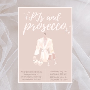 May include: Invitation to a "PJs and Prosecco" party. The invitation features a pink robe, champagne flutes, and slippers. The text reads "Wear pink silk pajamas, bring a bottle of champagne, and help us celebrate Sydney!" and "Saturday, July 13th starting at 3:00 pm 123 Washington St, City, State Zip Code".