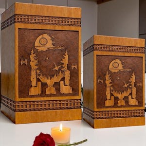 Decorative wooden urn box with detailed galactic walker and space themed laser engraving perfect for a sci-fi inspired memorial display.