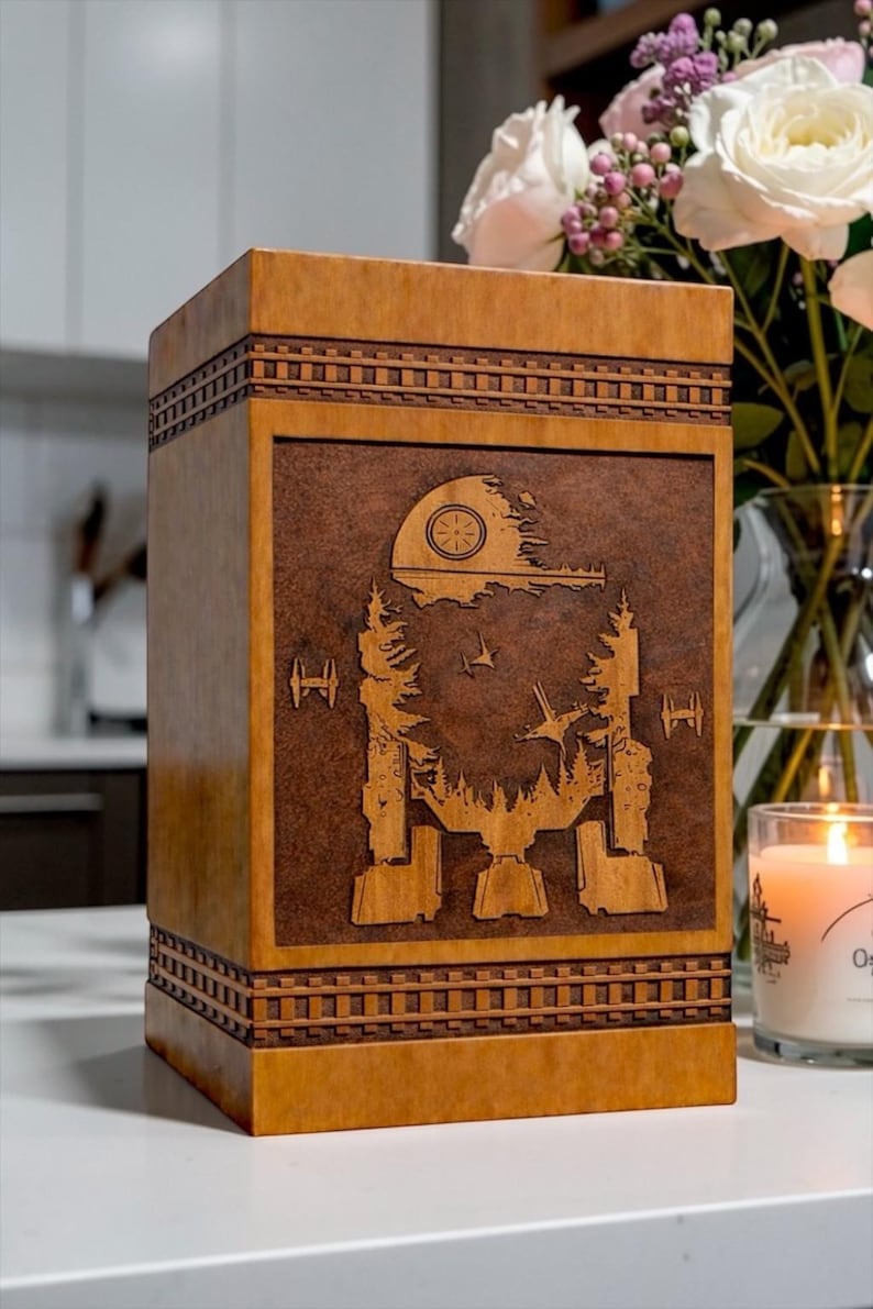 Space inspired memorial urn box featuring intricate galactic walker and cosmic scene engraving on handcrafted wooden cremation urn.