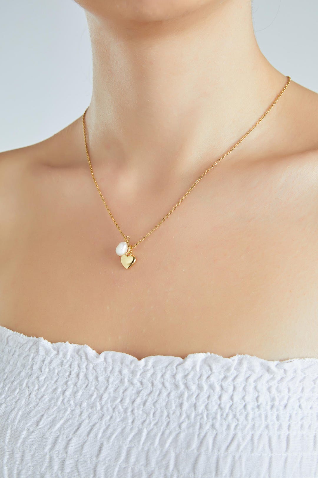 The Agape Pearl Heart Necklace-18k Gold main image 1