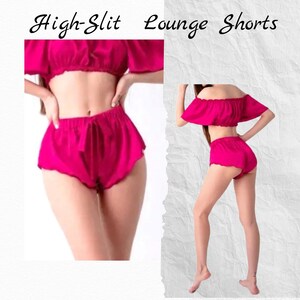 May include: A pink satin lounge set with a high-slit short and an off-the-shoulder top. The set features a drawstring waist and ruffled edges.