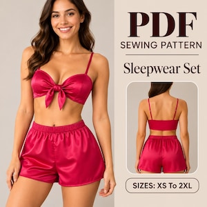 May include: A PDF sewing pattern for a sleepwear set in sizes XS to 2XL. The set includes a magenta satin bralette with a front tie detail and thin straps, paired with matching magenta satin shorts featuring an elasticized waistband.
