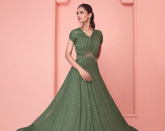 Exclusive green gown on pure georgette with indian inspired touch with embroidery