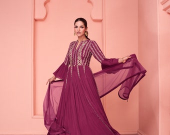 Exclusive dark pink gown on pure georgette with indian inspired touch with embroidery