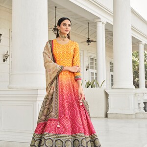 Shaded orange Bandhni Print Gown with Hand work Designer Latkan Kali and Duppatta gown on Dolla Silk Fabric bandhni gown designer gown image 1