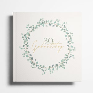 May include: A white card with a green eucalyptus wreath and the text "30. Geburtstag" in gold lettering.
