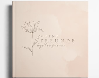 Pode incluir: Uma capa de livro rosa claro com um desenho simples de uma flor e o texto "MEINE FREUNDE together forever".