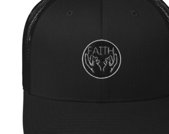 May include: Black trucker hat with a white embroidered design of two hands holding the word "FAITH" in a circle.
