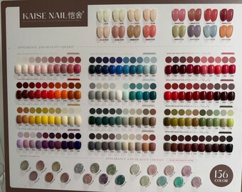 May include: A Kaise Nail colour chart display board featuring 156 individual nail polish samples arranged in rows and columns. The board includes various solid, sheer, and glitter finishes in a wide spectrum of colours, each labelled with a unique code.