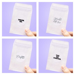 May include: Four white envelopes with different black text on round stickers. The stickers say "Throw Me", "Sprinkle with Love", "Confetti", and "You Me Forever".