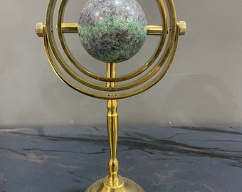 Ruby-zoizite on spinning stand brass stand